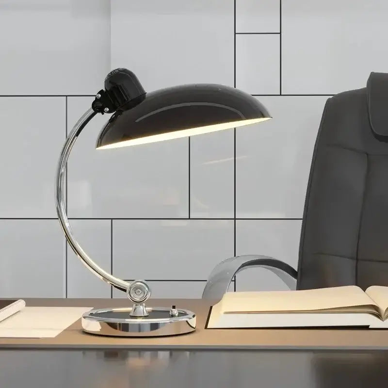 Bedside Table Lamp - Timeless Design and Modern Functionality in sleek black and chrome finish on a modern desk.