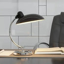 Bedside Table Lamp - Timeless Design and Modern Functionality in sleek black and chrome finish on a modern desk.