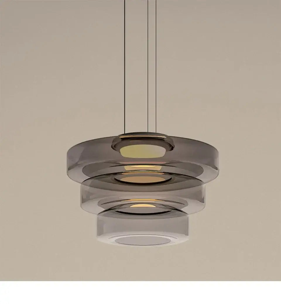 Layered Glass Pendant Light – Modern Amber, Green or Smoke Grey LED Suspension with artistic sculptural grey design.