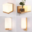 Wood and Frosted Glass Japanese Minimalist Sconces showcasing modern designs with plant integration.