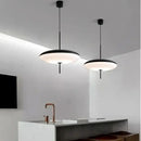 Nordic LED Pebble Pendant Light – Minimalist  Ceiling Lamp hanging in a modern kitchen with a sleek design.