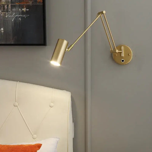Vintage Loft Bedside Reading Light Fixture attached to wall beside bed with modern design and adjustable arm.