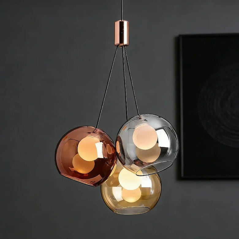Triple Glass Globe Pendant Light with Rose Gold Accents