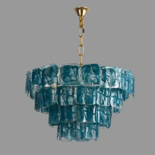 Blue Glass Chandelier with Polished Chrome Finish hanging elegantly to enhance your living space.