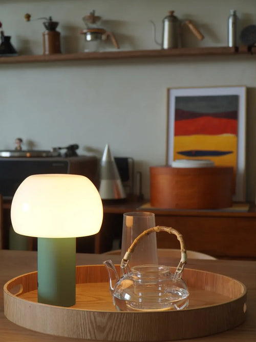 Modern Mushroom LED Table Lamp – Rechargeable & Portable Light on a wooden tray with a teapot and modern decor.