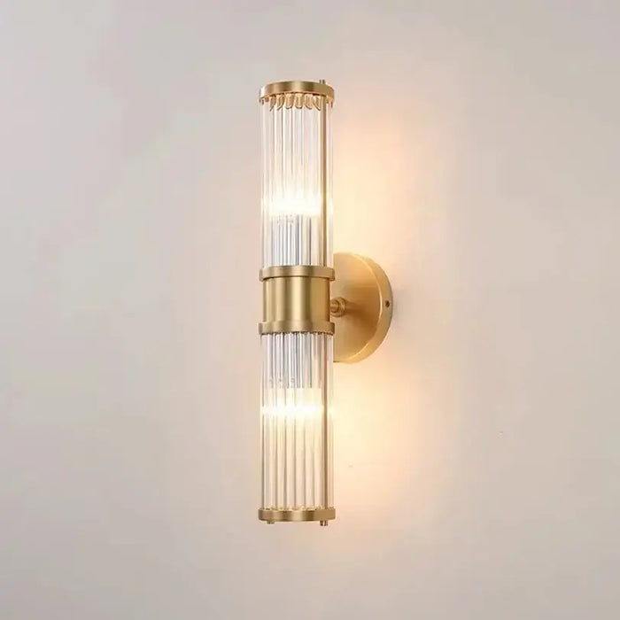 Unique Collection of Art Deco Sconces featuring elegant gold and crystal design, perfect for modern bathrooms and interiors.