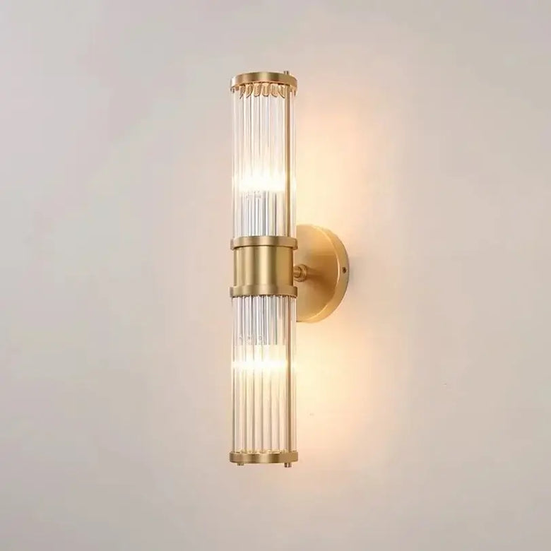 Unique Collection of Art Deco Sconces featuring elegant gold and crystal design, perfect for modern bathrooms and interiors.