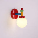 Lego like playful and colourful wall & ceiling light showcasing a vibrant design with round white globe and colorful accents.