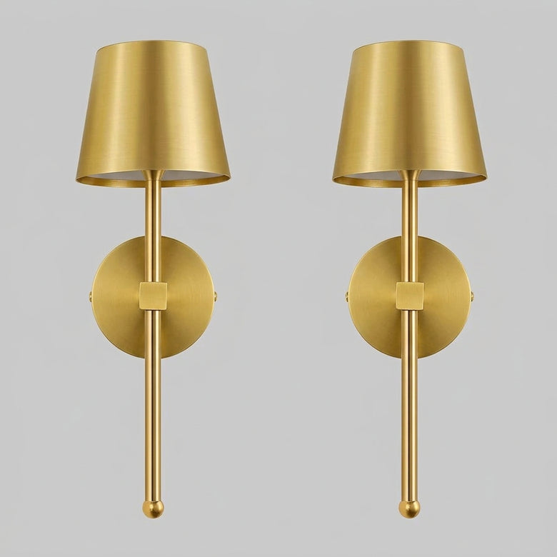 Hero Two gold wall sconces on a grey background.