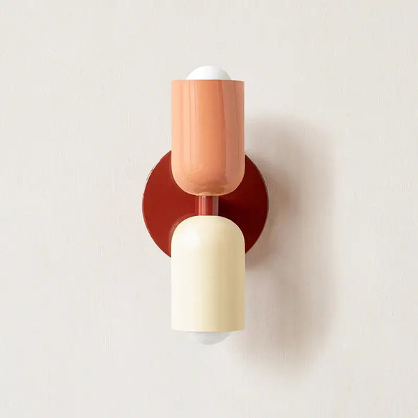 Classic Midcentury Modern Wall Lamp (10x25cm) in soft pastel colors on a wall.