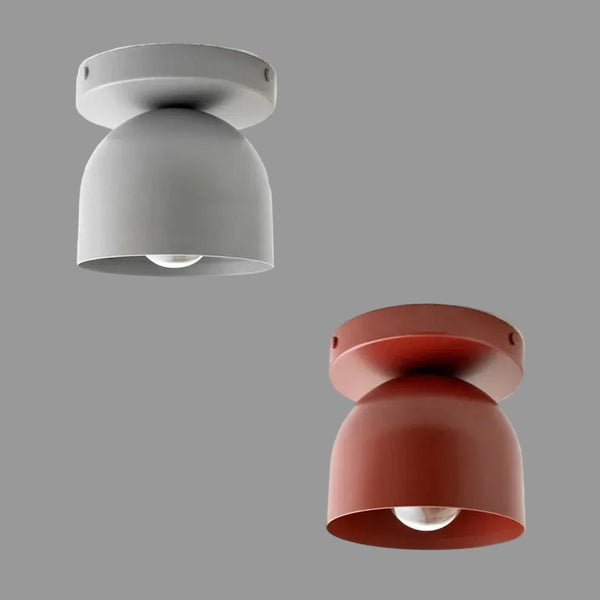 Two ceiling lights, one gray and one red, on a white background