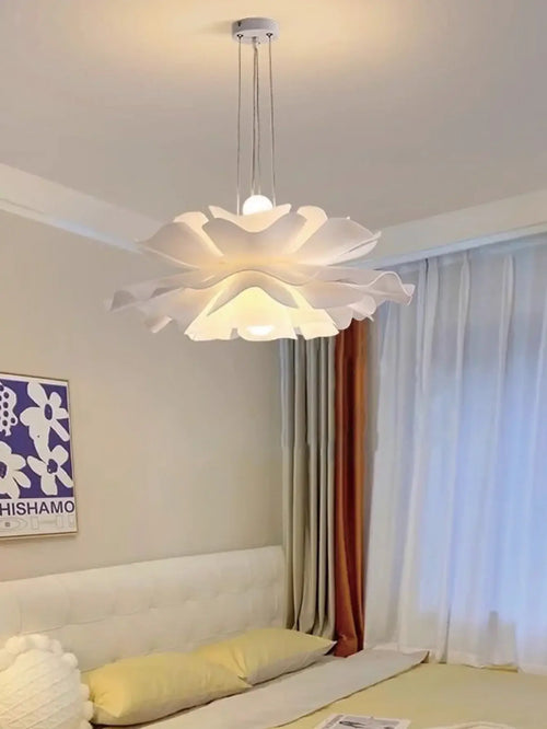 Nordic Simple Chandelier illuminating a serene bedroom with soft ambient light and Scandinavian design elegance.