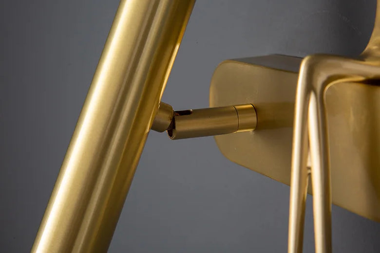 Minimalist Wall mounted Light with Seated human figure, Gold/Black