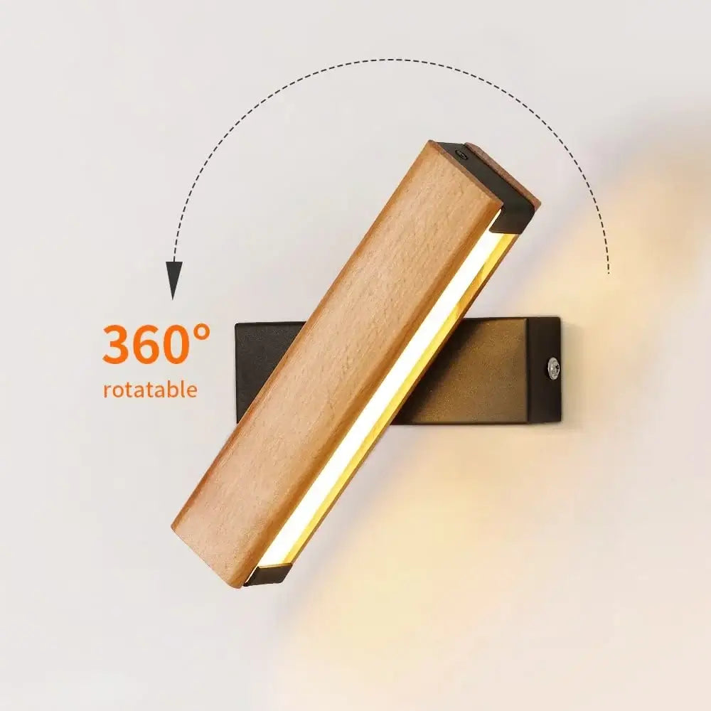 Rotating wood LED wall light, 360 degree rotatable, shown illuminated