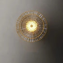 Art Deco Flower Wall Light illuminating with warm ambient glow and elegant design