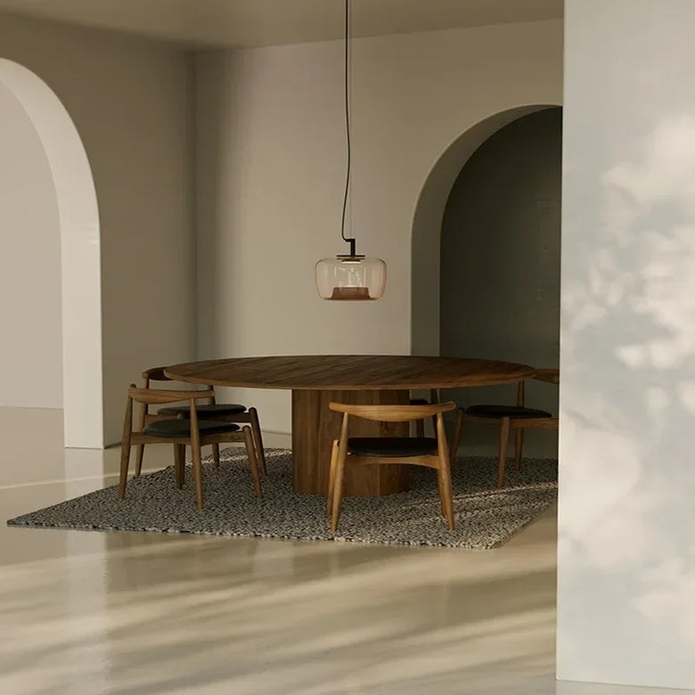 Modern Glass Pendant Light with Iron Detailing