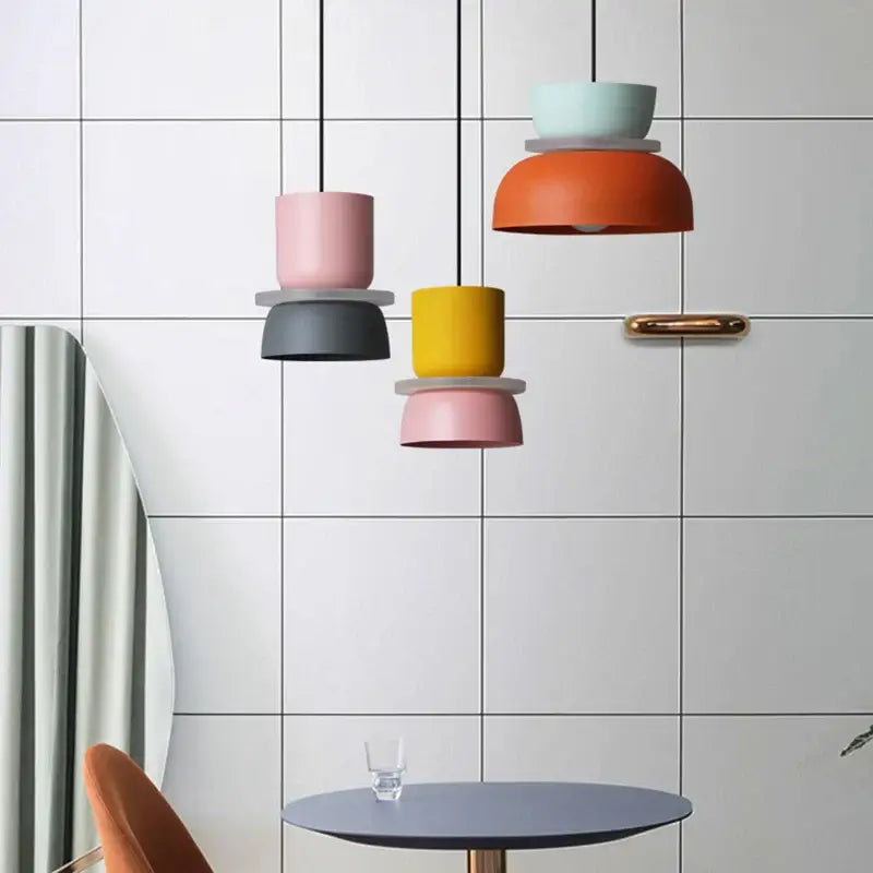 Customizable Modern Pendant Lights in vibrant colors hanging in a modern room setup.