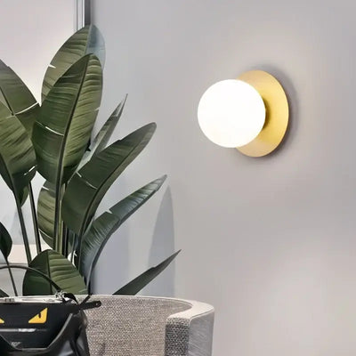 Simple Round Wall Lamp illuminating a modern interior with stylish design and energy-efficient lighting.