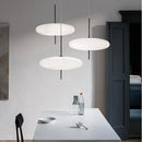 Nordic LED Pebble Pendant Light – Minimalist Ceiling Lamp hanging above a modern dining table in a stylish interior.
