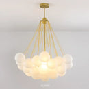Contemporary Frosted Glass Ball & Gold Chain Chandelier with elegant design and multiple glass balls for opulent illumination.