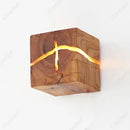 Natural Wood Wall Lights made from solid wood and epoxy resin for unique light diffusion.