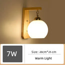 Wood and Frosted Glass Japanese Minimalist Sconces with warm light and wooden base, size 20cm x 25cm.