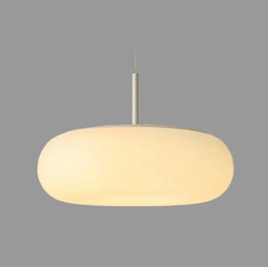 hero White pendant light against a beige wall
