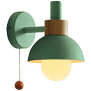 Pull Chain Nordic Sconce featuring a green dome shade and pull chain switch, perfect bedside light for a child's room.