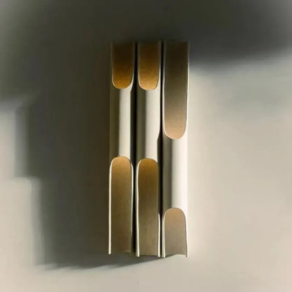 Modern Vertical LED Wall Lamp – Minimalist Aluminum Up & Down Light with sculptural design and warm ambient glow.