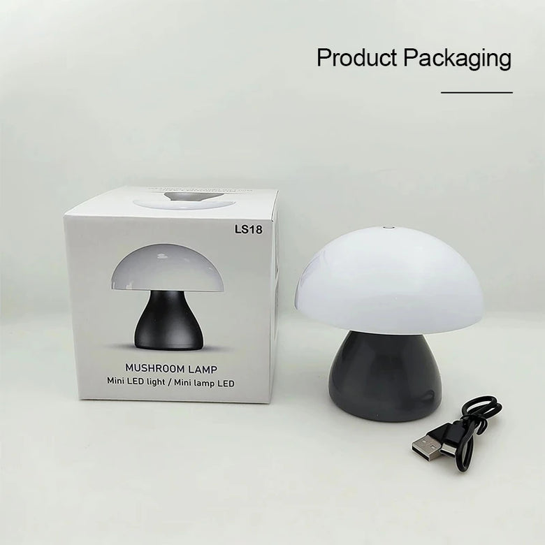Mushroom-shaped lamp with packaging and USB cable on a white background