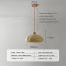 The Ideal Modern Kitchen Glass Pendant in cream color, featuring a pumpkin shape and adjustable length for modern kitchens.