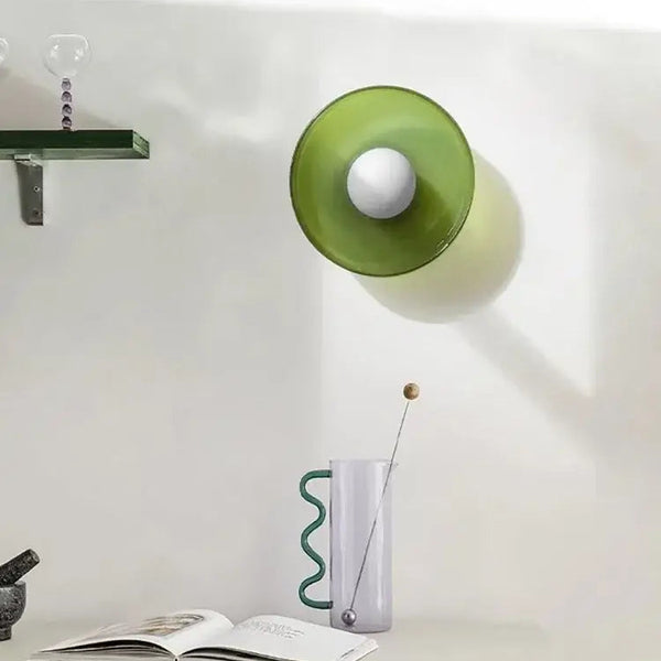 Nordic Modern Glass Disc Ceiling Light – Vibrant Single Head G9 Fixture for Hallways, Bedrooms & More on a minimalist wall.