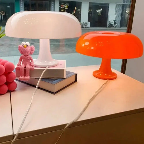 Italian 60s Lamp in white and orange, featuring modern minimalist LED design for ambient lighting.