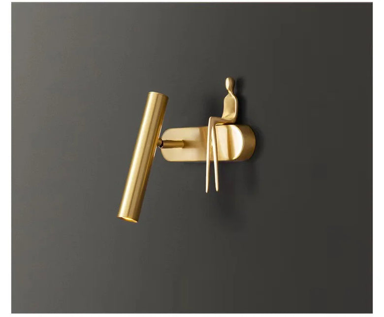 Minimalist Wall mounted Light with Seated human figure, Gold/Black