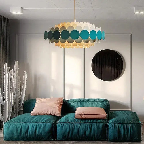 Vintage Mid-century modern Iconic Chandelier, comes in 3 sizes, hanging above a chic teal sofa in a stylish living room.