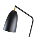 Danish Designer Grasshopper Floor Lamps featuring a sleek black shade and gold accent.