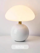 Mushroom LED USB Table Lamp in Pink – Soft Glow Bedside Lighting with a white base and soft, warm light.