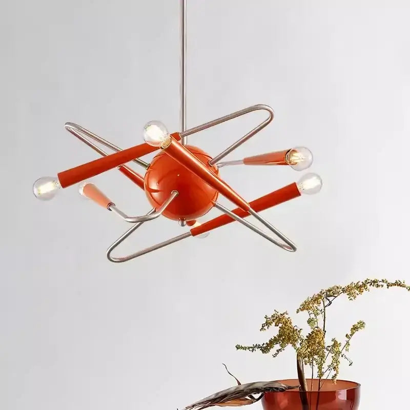 60s Red Sputnik Chandelier in bold red-orange finish hanging in a modern interior setting.