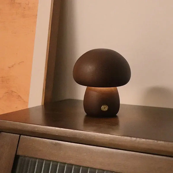 Portable Dimmable 60s Italy Designer Mushroom Table Lamp on a wooden surface, showcasing its warm glow and unique design.