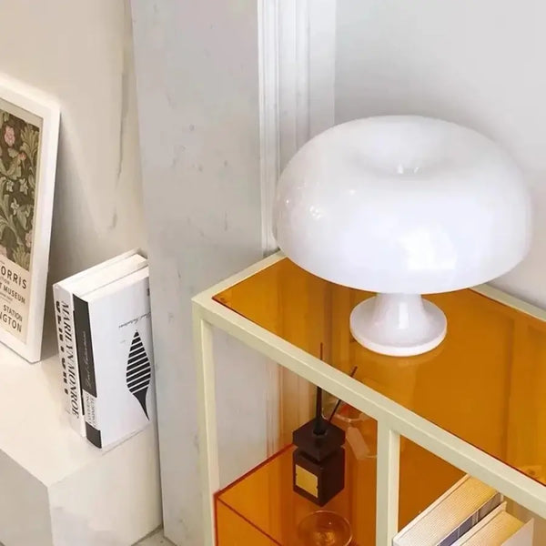 Italian 60s Lamp on a modern shelf, enhancing decor with its minimalist design and soft ambient lighting.