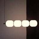 Modern Diffused Light Strip Pendant | Elegant Lighting Solution featuring four soft-lit spheres in an elegant design.