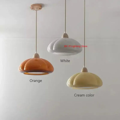 The Ideal Modern Kitchen Glass Pendant in orange, white, and cream colors showcasing Nordic style for modern kitchens.