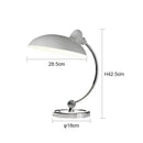 Bedside Table Lamp - Timeless Design and Modern Functionality with sleek white shade and chrome base.