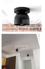 Compact Iron Ceiling Light with Dome Shade illuminating a stylish interior.
