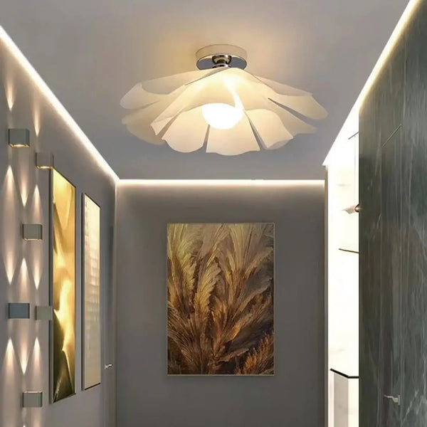 Nordic Simple Chandelier illuminating a stylish hallway with soft, diffused light and sleek design.