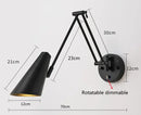 Vintage Loft Bedside Reading Light Fixture with adjustable arm and downward shade, perfect for focused illumination.