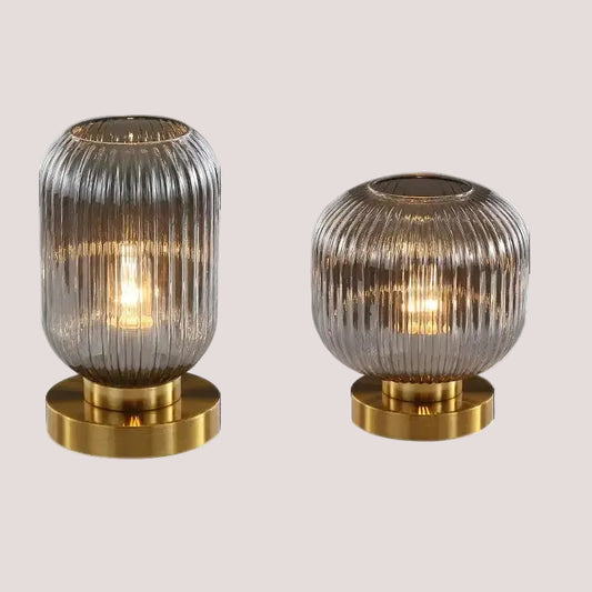 Modern Nordic Glass Table Lighting Fixtures with smoky gray glass and gold base, elegant lamps for living room or bedroom decor.