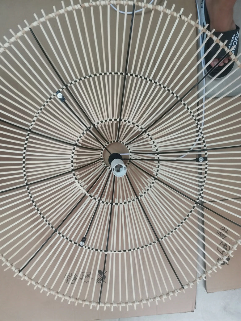 Vintage Designer Rattan Pendant Light showcasing unique rattan design and customizable bulb socket.
