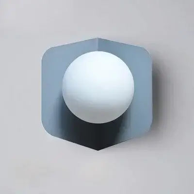 Chic Modern Sconce Collection – Illuminate with Style, featuring a contemporary design in iron and glass.