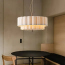 Wabi-Sabi Fabric Pendant Light – D45cm to D65cm hanging above a modern dining table in a serene setting.